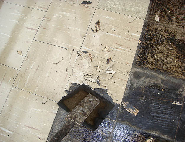 Hazards of DIY Tile Removal